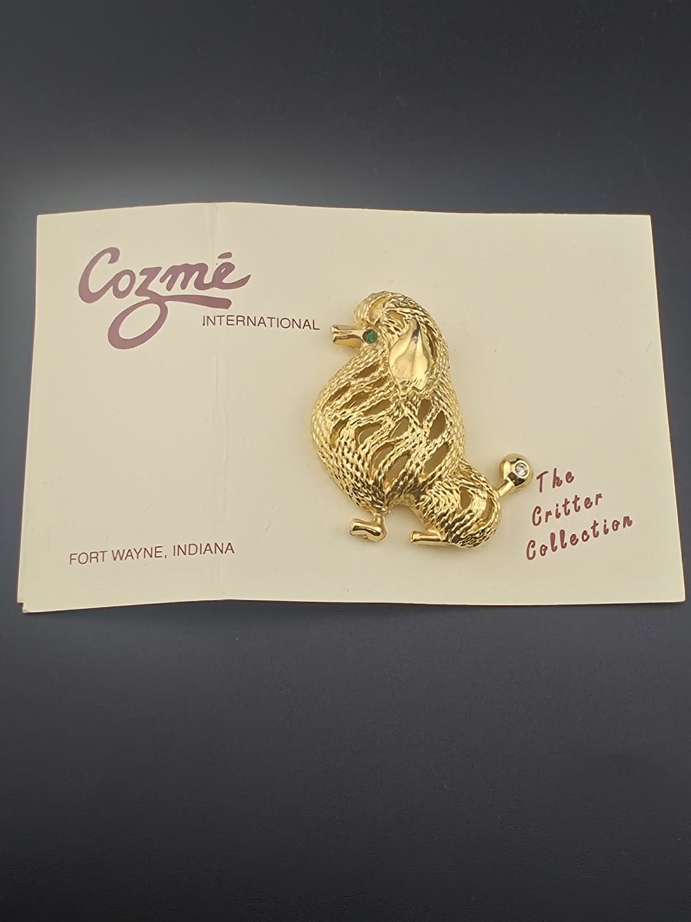 NOS Vintage Cozmé Gold-Tone Poodle Dog Brooch Green Rhinestone Eye